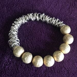 Designer made silver and gold bracelet